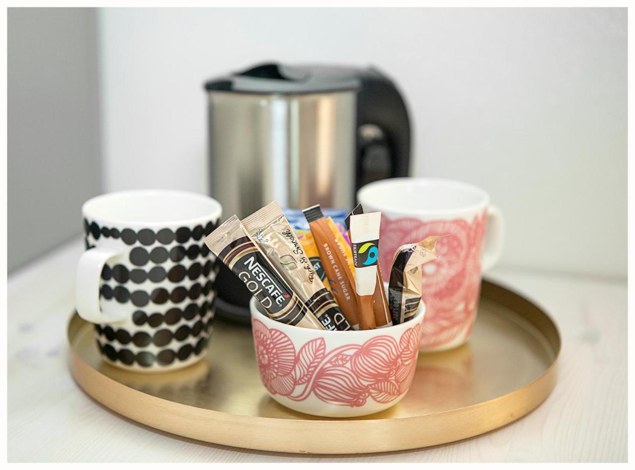 Crystal Arctic Suites Рованиеми Экстерьер фото Coffee and tea at a hotel